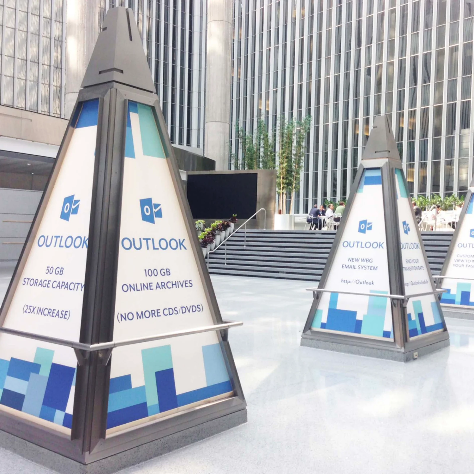 Environmental graphics on kiosks in the World Bank Group atrium for an internal Outlook rollout